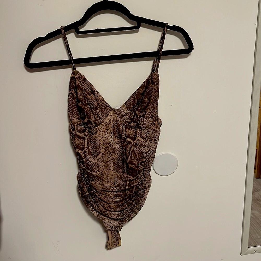 Extremely flattering, ‘Hey Babe’ brown-toned snake skin body suit